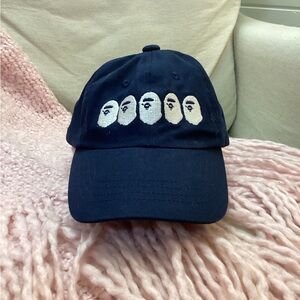 A Bathing Ape Navy Baseball Cap with Embroidered Face Motif